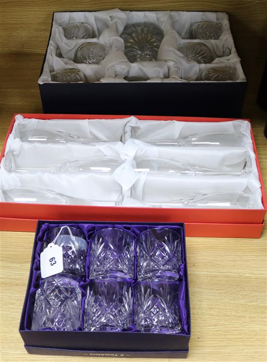 Three box sets of crystal glass ware including brandy glasses, champagne flutes and tumblers
